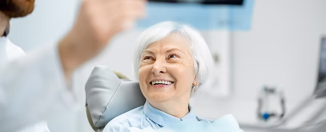 Confident mature woman smiling in Brisbane.